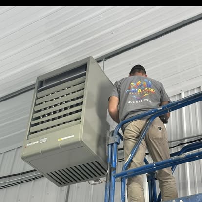 Climacare HVAC Technician installing commercial unit